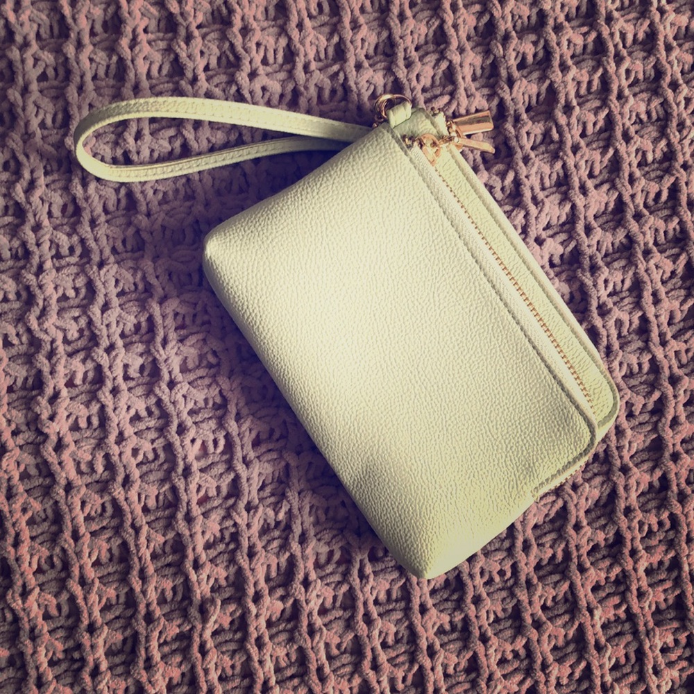 Green wristlet wallet.